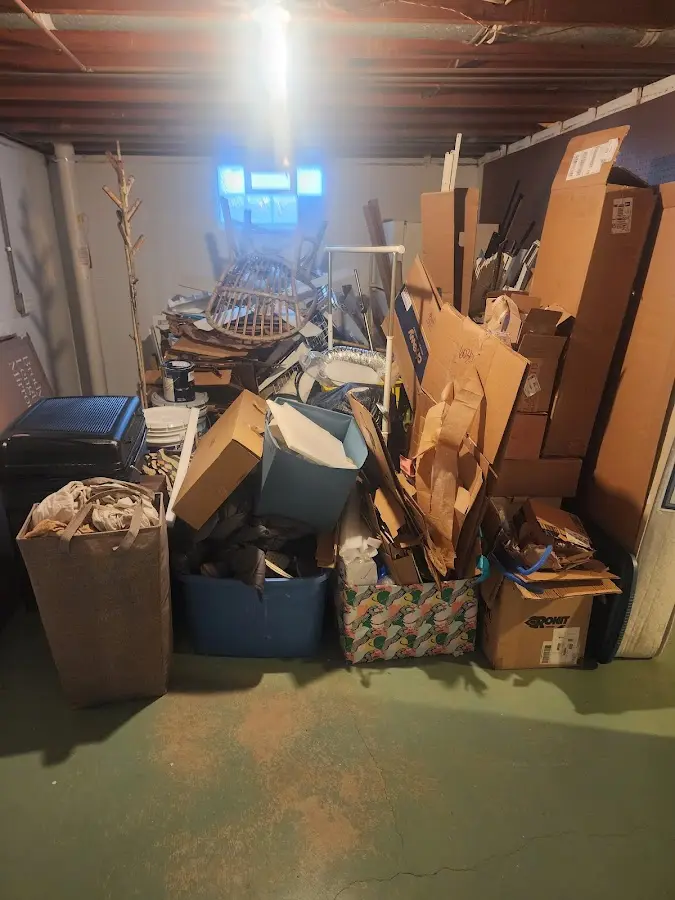 Roll-off dumpster container at job site for 2 Yard Dumpster Rental in Cheney